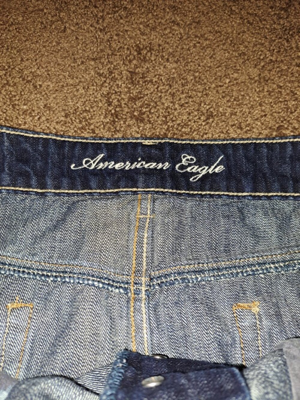 American Eagle dark wash denim mini skirt w/distressed embroidered pockets - Picture 5 of 9